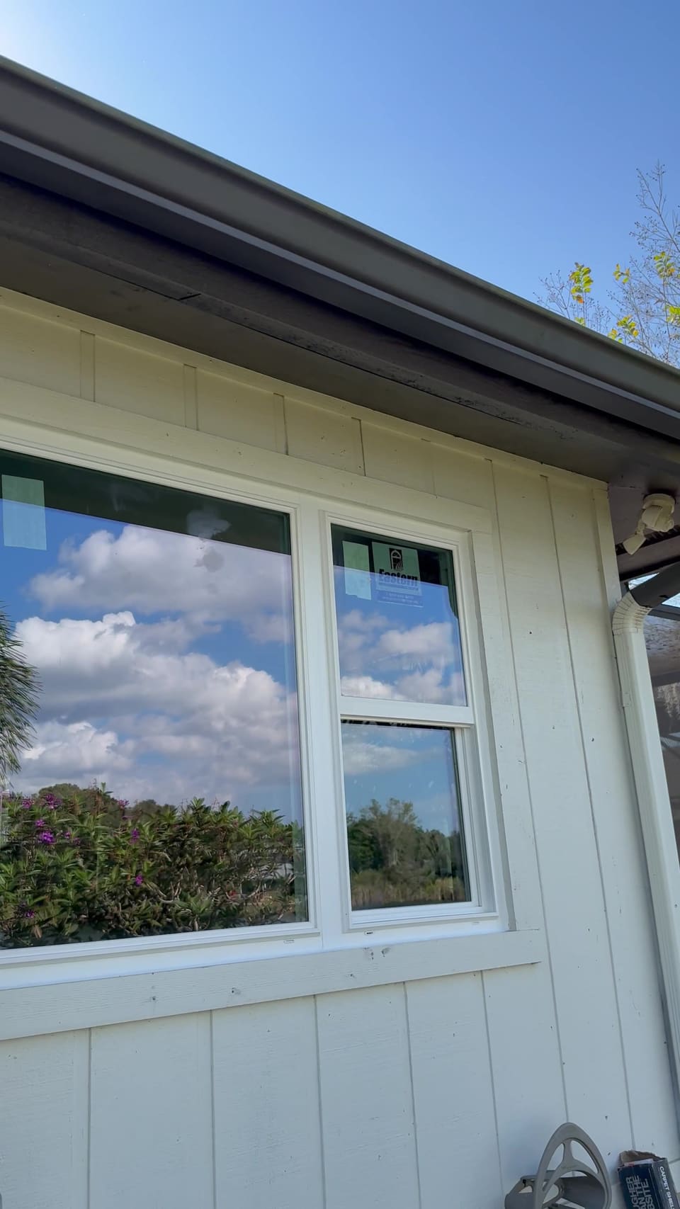New double hung and picture windows on a white Florida home